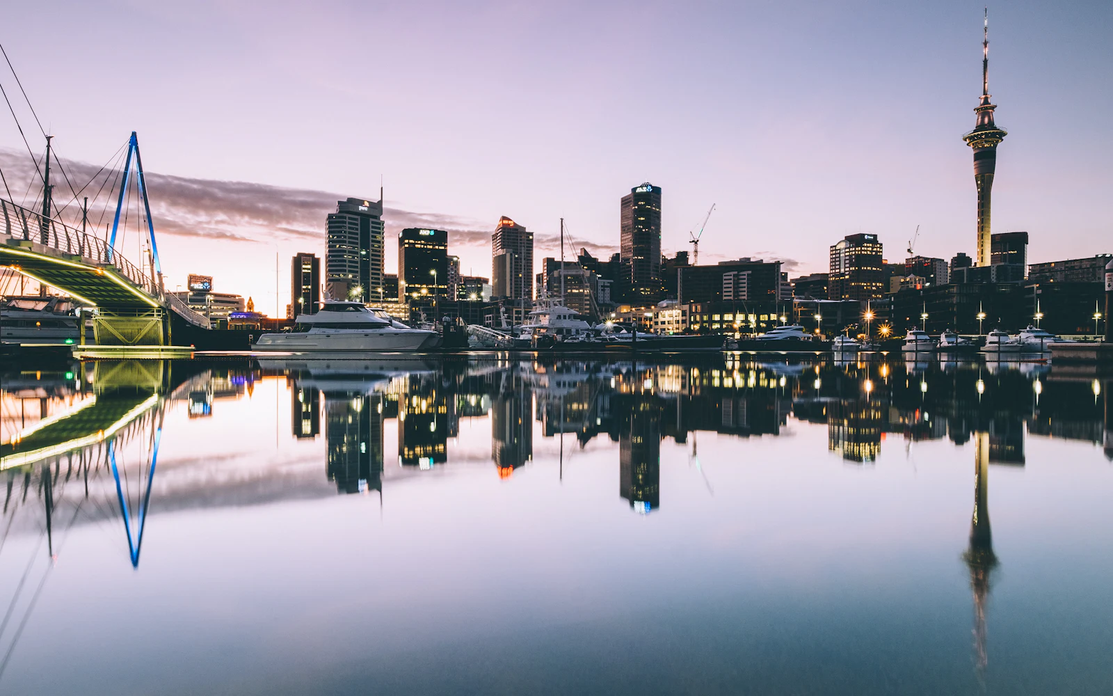Auckland waterfront skyline at dusk, New Zealand